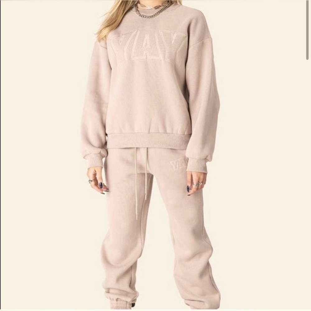 Adika sweatshirt and sweatpants set.  Size small.